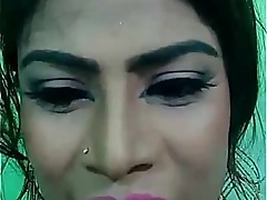 Busty Bangladeshi beauty Rasmi Alon strips down to lace lingerie for a teasing show.