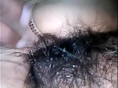 Indian beauty flaunts her hairy pussy and gets off with a banana.