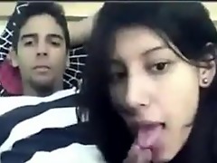 Indian lovers experiment with kinky sex positions on a bed, exploring their desires.
