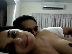 Seductive Indian teen engages in passionate web cam session.